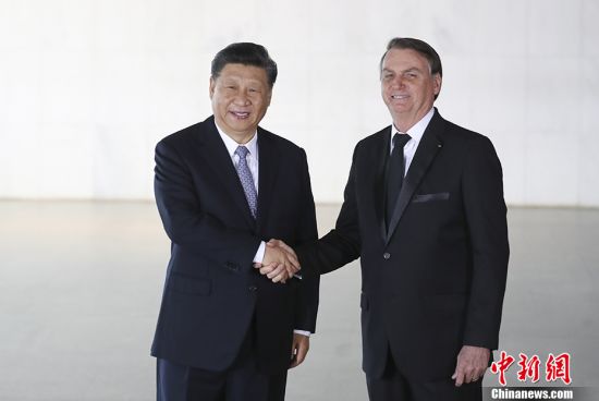 当地时间11月13日，中国国家主席习近平在巴西利亚同巴西总统博索纳罗会谈。中新社记者